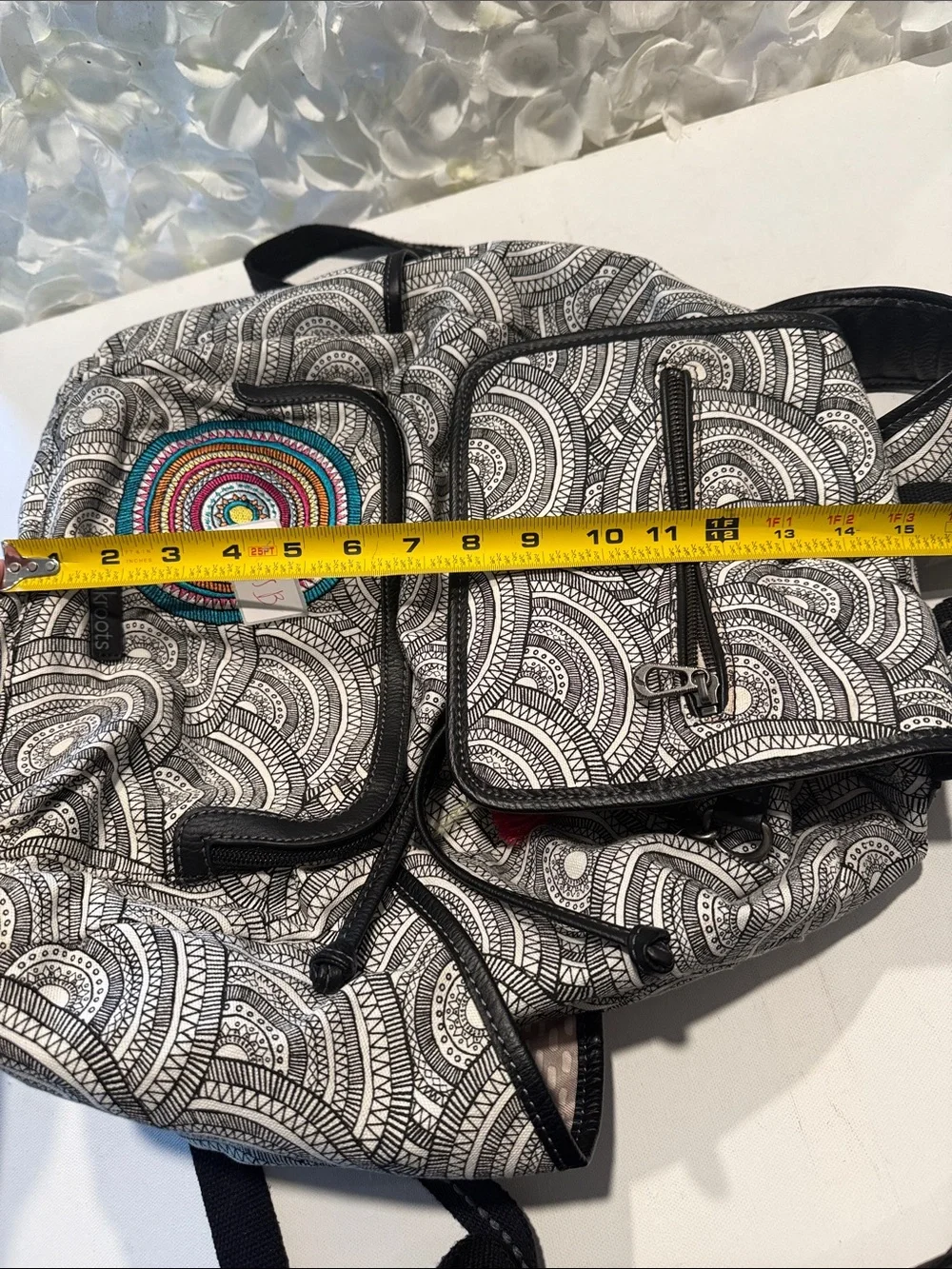Sakroots Black & White Patterned Backpack with Multicolor Embroidered Circle